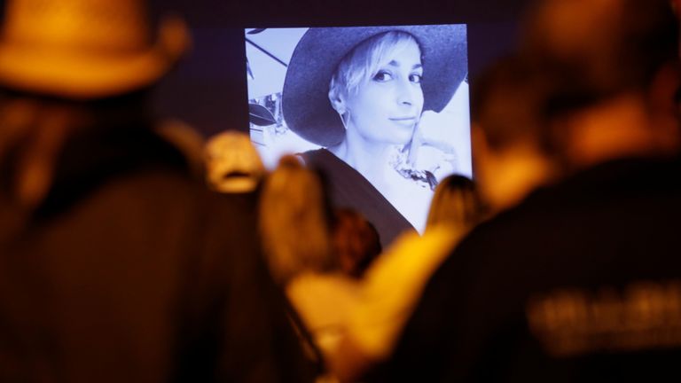 People attend a vigil for late cinematographer Halyna Hutchins, who was fatally shot on the film set of "Rust", in Burbank, Los Angeles, California, U.S. October 24, 2021. REUTERS/Mario Anzuoni
