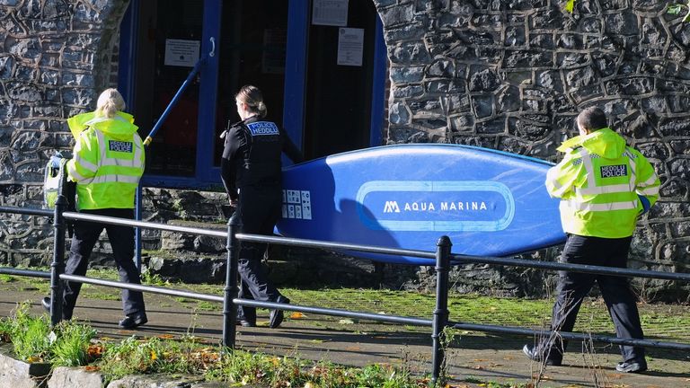 A paddle board being carried by police. Pic: Martin Cavaney