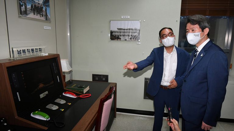 South Korean Unification Minister Lee In-young inspects the inter-Korean hotline at the truce village of Panmunjom inside the demilitarized zone separating the two Koreas, South Korea, September 16, 2020