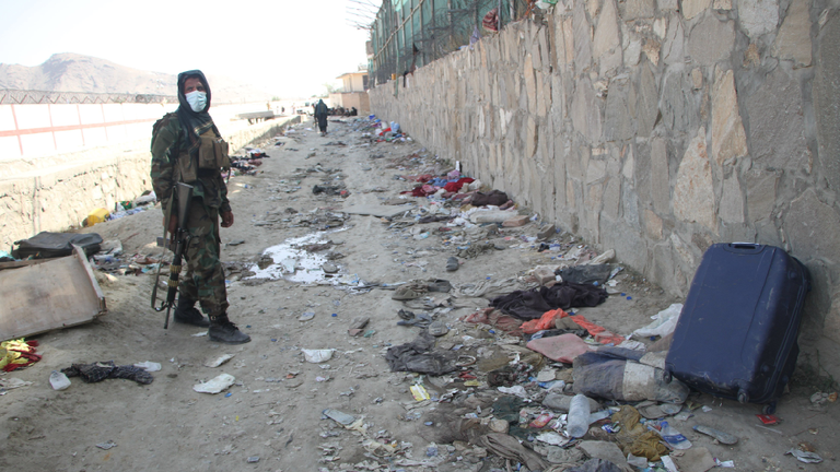 Mandatory Credit: Photo by Xinhua/Shutterstock (12374650e)

A taliban member is seen at the explosion site near the Kabul airport in Afghanistan, Aug. 27, 2021. The death toll from the Kabul airport attacks on Thursday has reportedly risen to at least 103.

Afghanistan Kabul Airport Attack Explosion Site - 27 Aug 2021