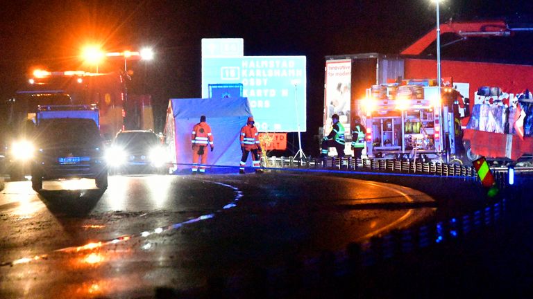 People work on the scene after an accident on Sunday, Oct. 3, 2021 outside the town Markaryd in Sweden. Three people died in the accident one of them is the Swedish artist Lars Vilks and the other two were police officers. 