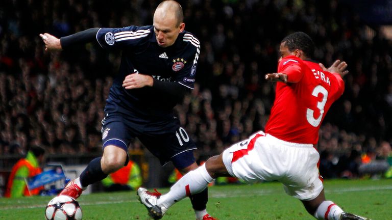 Manchester United's Patrice Evra, (R), vies for the ball against Bayern Munich's Arjen Robben in 2010