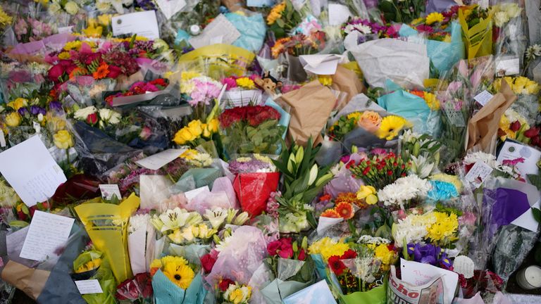 An edition of the Southend Echo tucked into one of the floral tributes left outside the Belfairs Methodist Church in Leigh-on-Sea, Essex, where Conservative MP Sir David Amess was killed on Friday. Picture date: Tuesday October 19, 2021.

