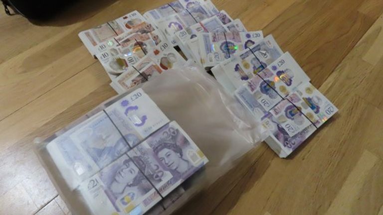 Drugs and cash were recovered during the raid. Pic: Met Police