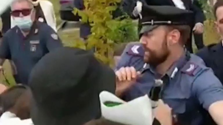 Climate activists clash with police in Milan