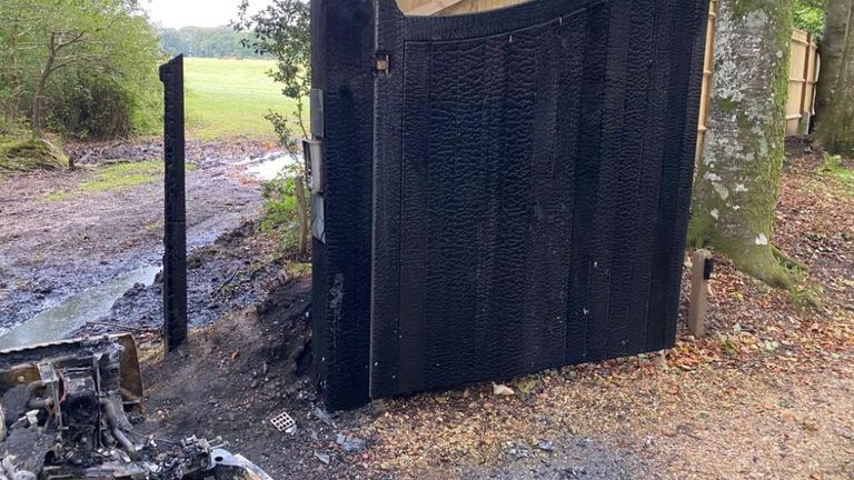 BBC presenter Chris Packham&#39;s front gate. It was burnt after someone set a Land Rover alight. 
