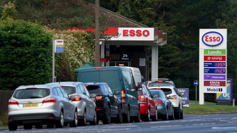 Motorists queue for fuel at an Esso petrol station in Ashford, Kent. Picture date: Monday October 4, 2021.