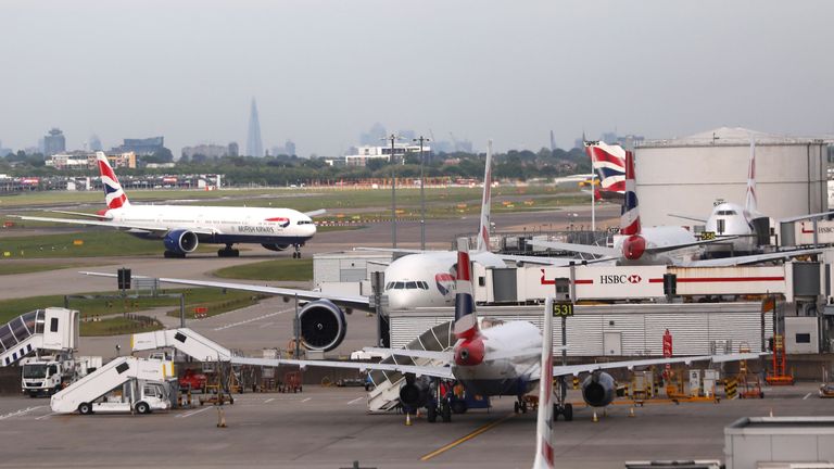 British Airways planes are seen at Heathrow Terminal 5 in London, Britain May 27, 2017. REUTERS/Neil Hall