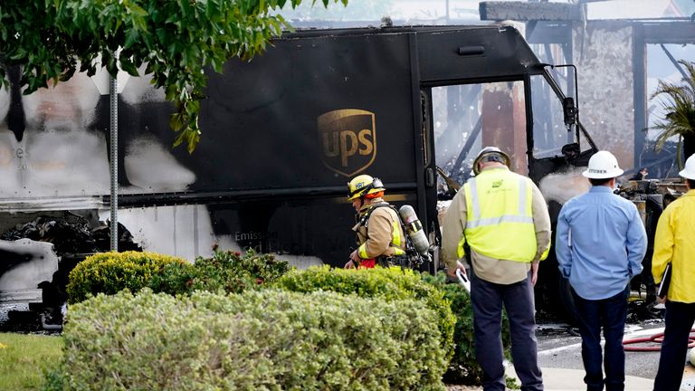 AP - Fire and safety crews work the scene of a small plane crash, Monday, Oct. 11, 2021, in Santee, Calif. At least two people were killed and two others were injured when the plane crashed into a suburban Southern California neighborhood, setting two homes ablaze, authorities said. (AP Photo/Gregory Bull)


