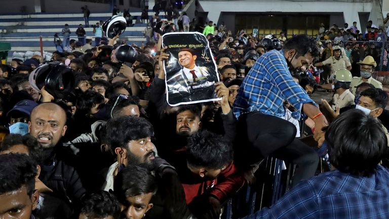 Fans arrive to pay their respect to the late actor Puneeth Rajkumar, 46, at the Sree Kanteerava Stadium in Bengaluru, India, October 29, 2021. REUTERS/Stringer NO ARCHIVES. NO RESALES.
