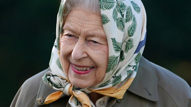 The Queen takes part in a planting at Balmoral on Friday