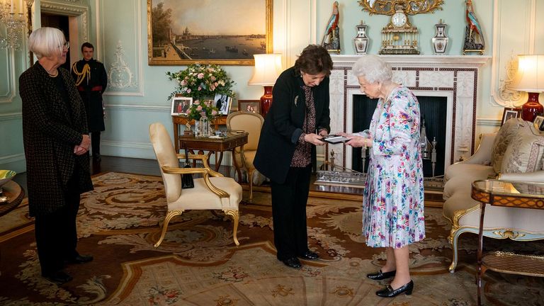 Imogen Cooper is received by Britain&#39;s Queen Elizabeth at Buckingham Palace and presented with The Queen&#39;s Medal for Music for 2019, London, Britain October 13, 2021. Aaron Chown/Pool via REUTERS