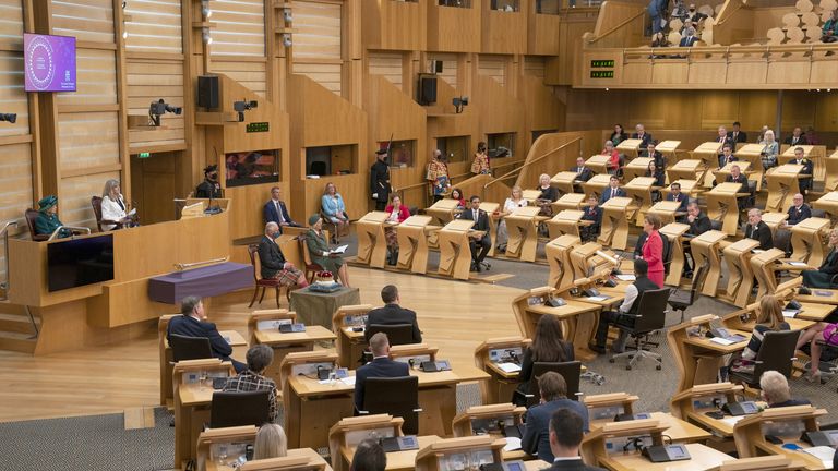 First Minister Nicola Sturgeon delivers a speech in the debating chamber of the Scottish Parliament after the Queen has opened the session