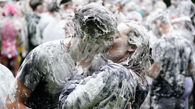 Hundreds of students take part in the traditional Raisin Monday foam fight on St Salvator&#39;s Lower College Lawn at the University of St Andrews in Fife. Picture date: Monday October 18, 2021.
