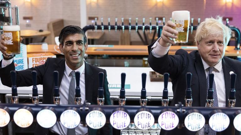 Prime Minister Boris Johnson with Chancellor of the Exchequer Rishi Sunak during a visit to Fourpure Brewery in Bermondsey, London