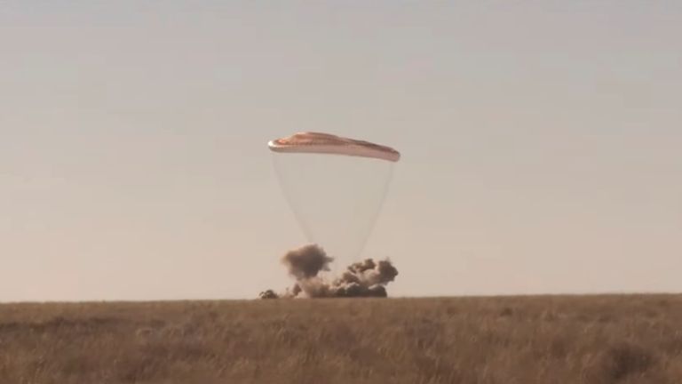 The capsule lands on the Kazakh steppe. Pic: Roscosmos via Reuters