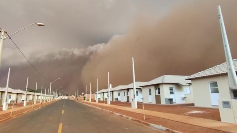A sandstorm made by powerful winds whipping up dust from the ground has engulfed an area of Brazil.