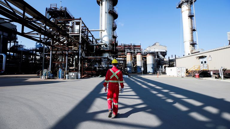 A Shell employee walks through the company&#39;s new Quest Carbon Capture and Storage (CCS) facility 