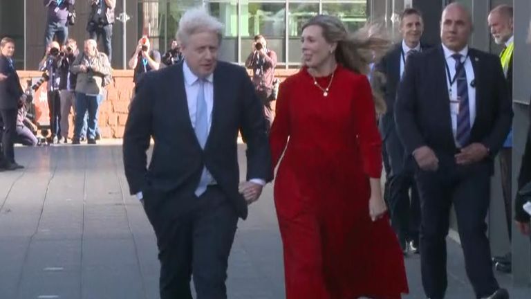 Carrie and Boris Johnson walk to the Centre
