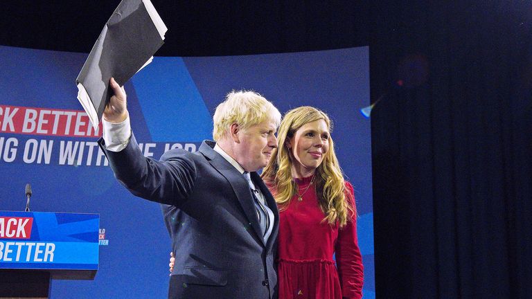 Prime Minister Boris Johnson is joined by his wife Carrie on stage after delivering his keynote speech at the Conservative Party Conference in Manchester. Picture date: Wednesday October 6, 2021.