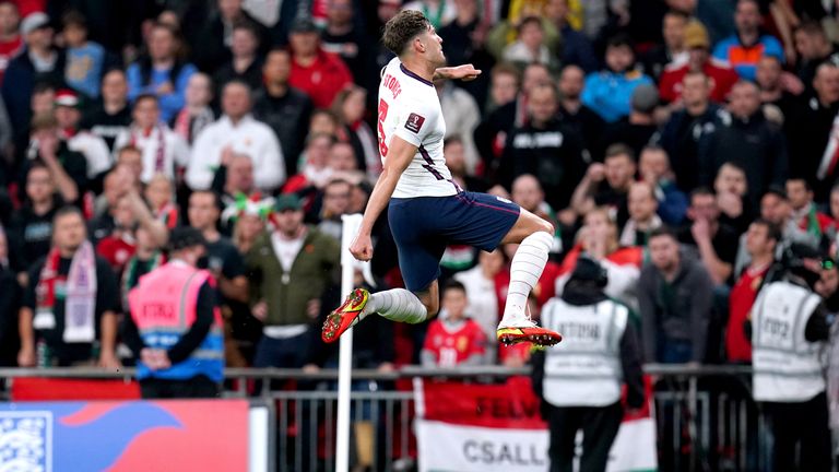 England's John Stones celebrates scoring their side's first goal of the game