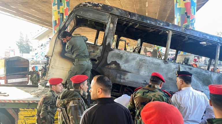 Military police inspect the site of an explosion in central Damascus, Syria October 20, 2021. REUTERS/Firas Makdesi