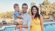 Amber Boniface and her husband with their son