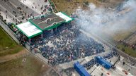 Polish police block migrants who gather on the Belarusian-Polish border in an attempt to cross it at the Kuznica Bialostocka-Bruzgi border crossing, Poland in this photograph released by the Police, November 15, 2021. Policja Podlaska/Handout via REUTERS NO RESALES. NO ARCHIVES. MANDATORY CREDIT. THIS IMAGE HAS BEEN SUPPLIED BY A THIRD PARTY. TPX IMAGES OF THE DAY 