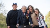 File photo dated 16/04/2020 of the then 99-year-old war veteran Captain Tom Moore, with (left to right) grandson Benji, daughter Hannah Ingram-Moore and granddaughter Georgia, at his home in Marston Moretaine, Bedfordshire, after he achieved his goal of 100 laps of his garden. Captain Sir Tom Moore has died at the age of 100 after testing positive for Covid-19, his daughters Hannah and Lucy said in a statement. Issue date: Tuesday February 2, 2021.
