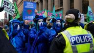 Extinction Rebellion activists take part in a demonstration against &#39;Greenwashing&#39; (an attempt to make people believe that your company or government is doing more to protect the environment than it really is) near the COP26 U.N. Climate Summit in Glasgow, Scotland, Wednesday, Nov. 3, 2021. (AP Photo/Alastair Grant)  PIC:AP    
