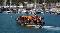A group of people thought to be migrants are taken to Dover onboard a lifeboat following a small boat incident in the Channel on Tuesday