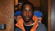 Rudy Guede is escorted to the courthouse for his appeal against the sentence he received in the Meredith Kercher murder trial, in Perugia December 21, 2009. Guede, an Ivorian drifter with a criminal record, was sentenced in October 2008 to 30 years in jail for taking part in Kercher's murder. REUTERSAlessandro Bianchi (ITALY - Tags: CRIME LAW)
