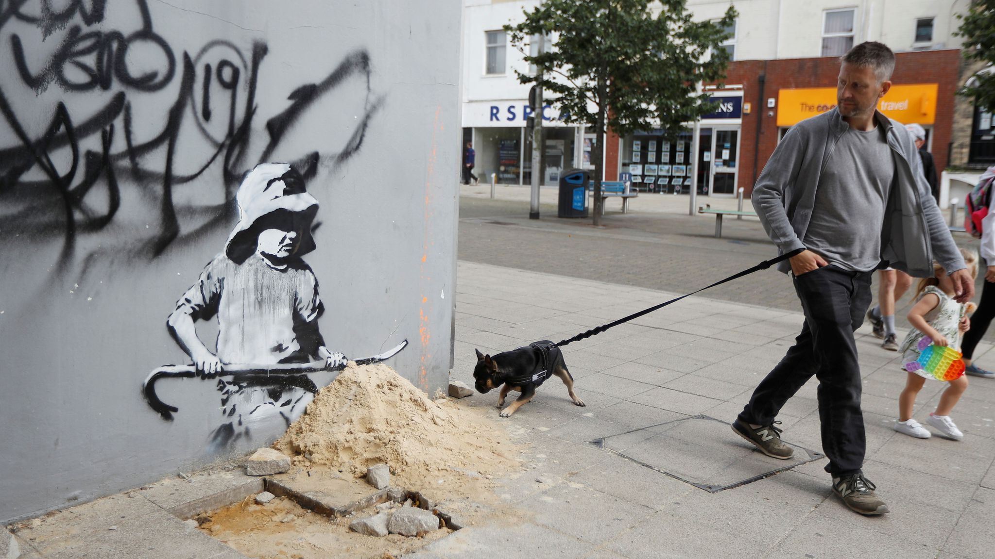 Banksy art carved off wall in Lowestoft so it can be sold in US for millions - UK News - Sky News