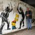 Terminally ill man arrested for mooning speed camera 'inspires' new 'Banksy' Bart Simpson mural