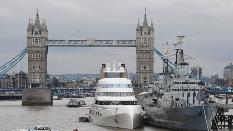 Superyacht "Motor Yacht A", owned by Russian tycoon Andrey Melnichenko, is seen moored on the River Thames besides HMS Belfast (R) in London, Britain September 6, 2016. REUTERS/Toby Melville