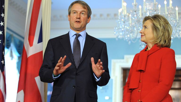 US Secretary of State Hillary Clinton (R) shakes hands with Britain&#39;s Secretary of State for Northern Ireland Owen Paterson (L) at the start of a US-Northern Ireland Economic conference at the State Department in Washington, October 19, 2010. REUTERS/Jonathan Ernst (UNITED STATES - Tags: POLITICS)
