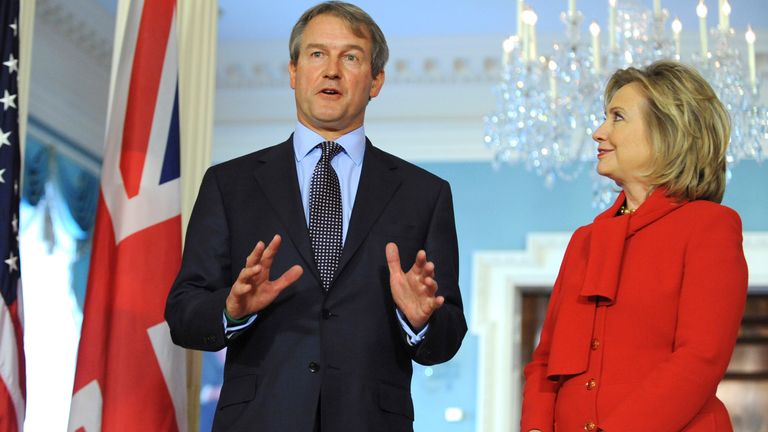 US Secretary of State Hillary Clinton (R) shakes hands with Britain&#39;s Secretary of State for Northern Ireland Owen Paterson (L) at the start of a US-Northern Ireland Economic conference at the State Department in Washington, October 19, 2010. REUTERS/Jonathan Ernst (UNITED STATES - Tags: POLITICS)
