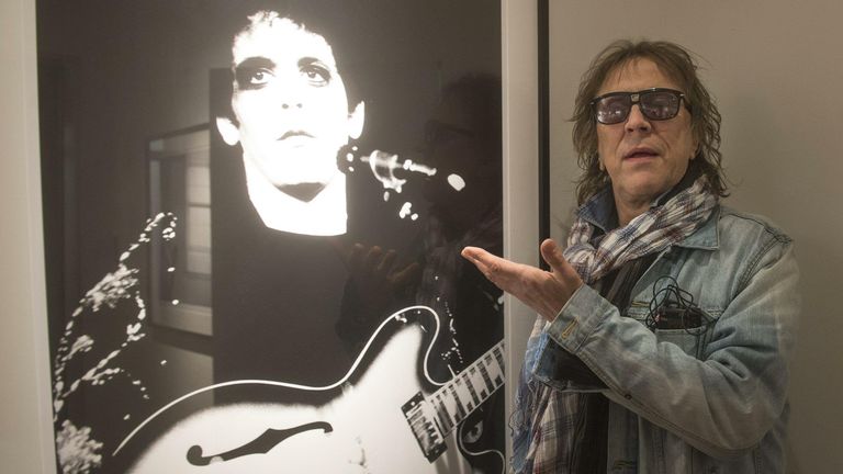 British photographer Mick Rock stands by his photo of American rock musician Lou Reed during the opening of the photo exhibition &#39;Mick Rock - the man who shot the 70&#39;s&#39; at the Pelle Unger gallery in Stockholm, Sweden, on April 11, 2013. - Image ID: 2GJ7TE5 (RM)

