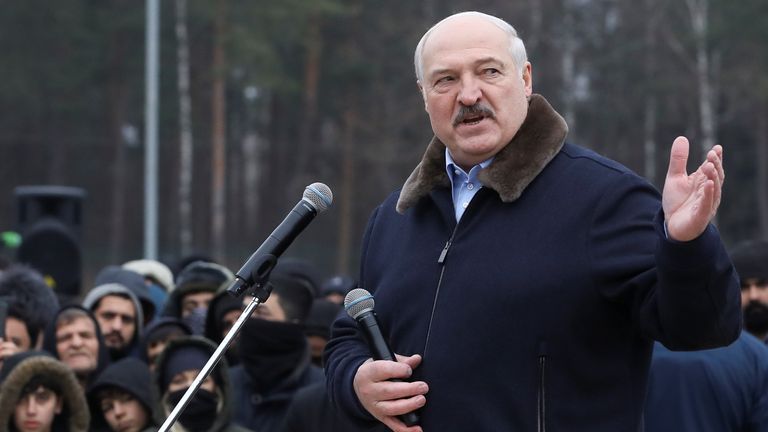 Belarusian President Alexander Lukashenko speaks to migrants as he visits the transport and logistics centre Bruzgi on the Belarusian-Polish border, in the Grodno region, Belarus November 26, 2021. REUTERS/Kacper Pempel