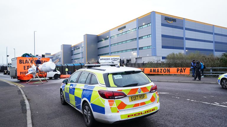 Police outside the entrance to the Amazon fulfilment centre in Tilbury as XR protests target the retailer