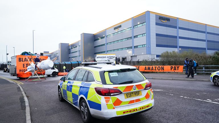 Police outside  the entrance to the Amazon fulfilment centre in Tilbury as XR protests target the retailer