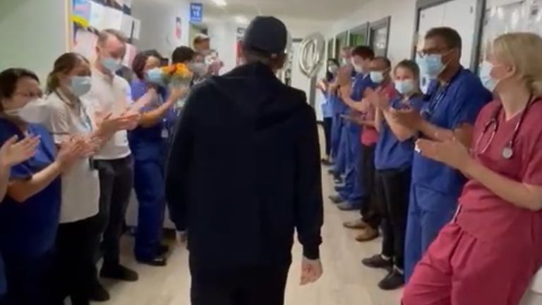 Andy Watts was applauded by medical staff as he left the hospital after 10 months