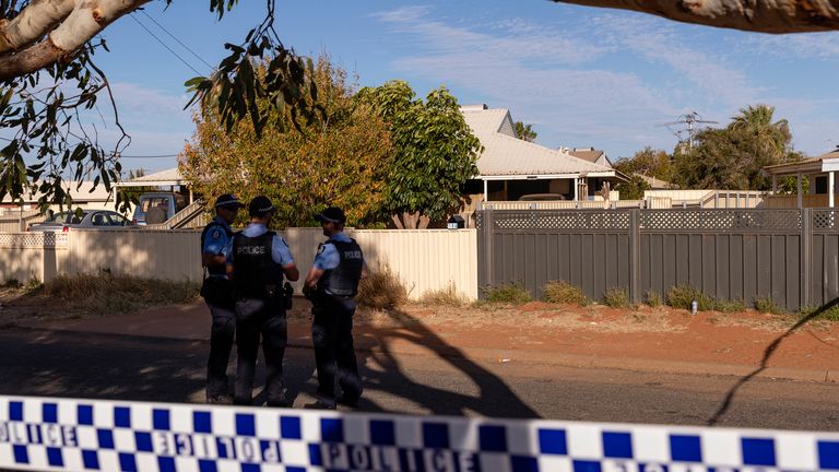 Police stand guard outside the house where missing 4-year-old Cleo Smith was rescued by police in Carnarvon, 900km north of Perth, Australia, Wednesday, Nov. 3, 2021. Police smashed their way into a house and rescued Cleo whose disappearance from her family&#39;s camping tent on Australia&#39;s remote west coast more than two weeks ago both horrified and captivated the nation. 
PIC:AAP/AP