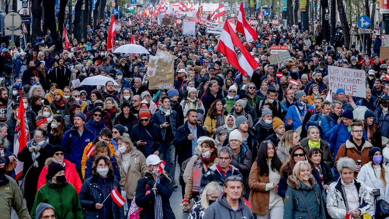 Hundreds of people take part in a demonstration against the country&#39;s coronavirus restrictions in Vienna, Austria, Saturday, Nov.20, 2021. Thousands of protesters are expected to gather in Vienna after the Austrian government announced a nationwide lockdown to contain the quickly rising coronavirus infections in the country.