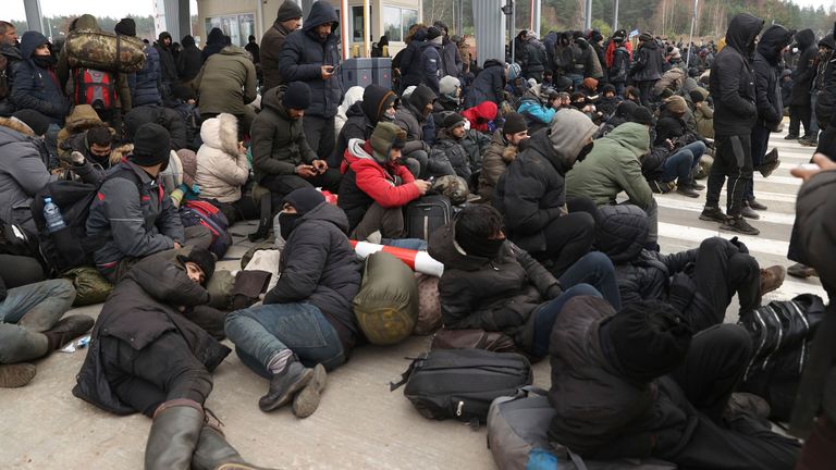 Migrants gather in front of a barbed wire fence at the checkpoint "Kuznitsa" at the Belarus-Poland border near Grodno, Belarus, on Monday, Nov. 15, 2021. European Union foreign ministers are expected Monday to decide to expand sanctions against Belarus to include airlines, travel agents and individuals alleged to be helping to lure migrants to Europe as part of a "hybrid attack" against the bloc by President Alexander Lukashenko. (Oksana Manchuk/BelTA pool photo via AP)
PIC:AP
