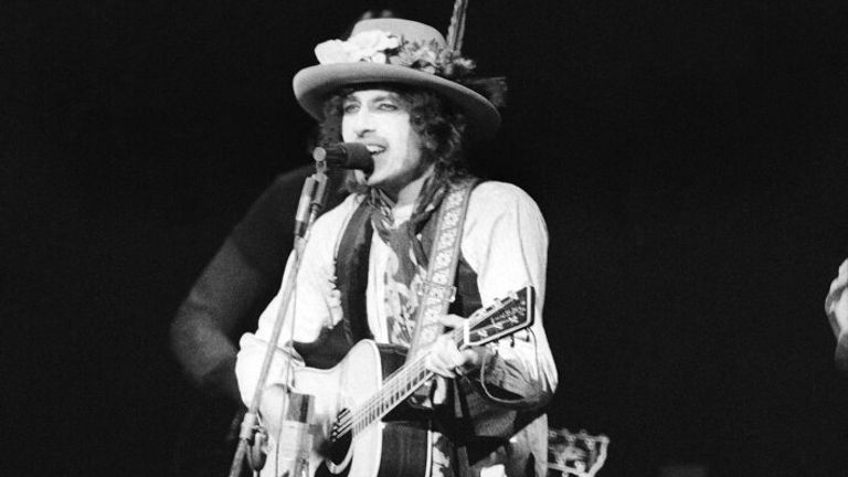 Bob Dylan in New York in 1975 performing at a benefit concert for Rubin 'Hurricane' Carter. Pic: AP 