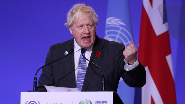 FILE PHOTO: Britain&#39;s Prime Minister Boris Johnson delivers a speech during the opening ceremony of the UN Climate Change Conference (COP26) in Glasgow, Scotland, Britain, November 1, 2021. REUTERS/Yves Herman/Pool/File Photo