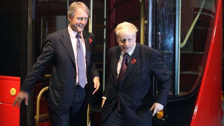 Secretary of State for Northern Ireland Owen Paterson (left) and London Mayor Boris Johnson during the unveiling a life-size mock-up of the new hop-on, hop-off double-decker bus for London based on the driver-and-conductor Routemaster in Acton in west London.