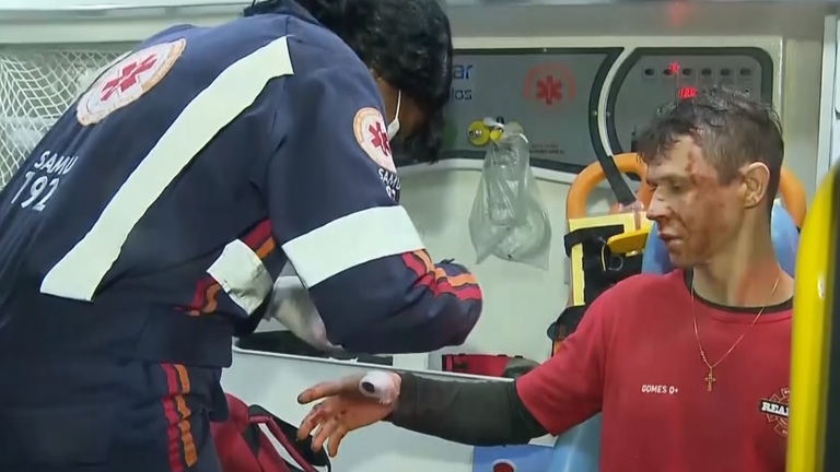 A paramedic attends an injured man after a cave collapse in Brazil. Pic: Sao Paulo military firefighters  