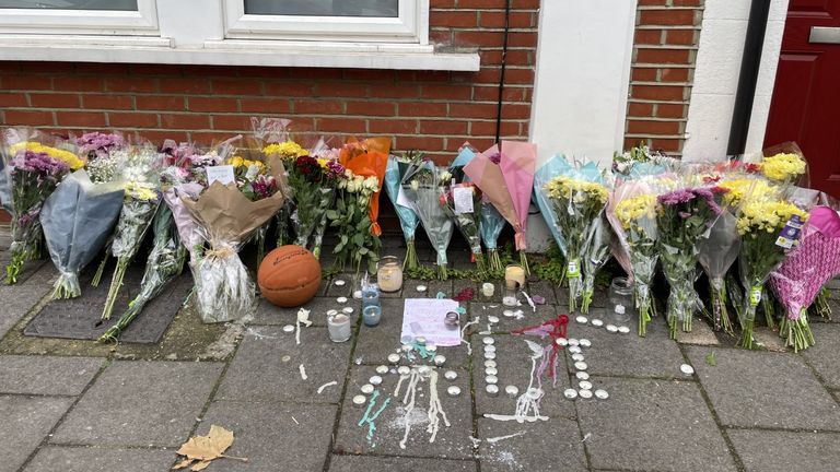 Flowers were left at the scene of the stabbings